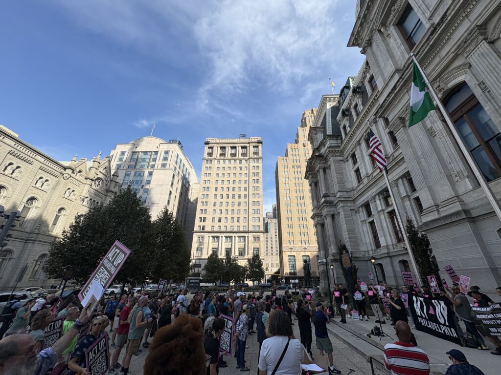 A crowd of protestors gathered outside of City Hall this afternoon to call for a reversal of federal cuts to Medicaid