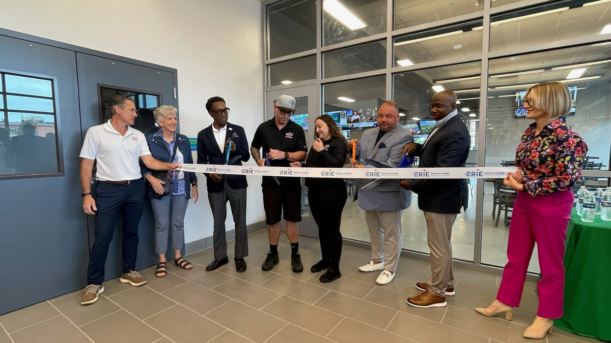 From left to right, Gus Pine, Kathy Dahlkemper, Ben Wilson, Michael Miodis, Dezirae Miodis, Jeremy Peterson, Brendon Mendoza and Emily Fetcko cut the ribbon to the new Odis 12 location at the Erie Metropolitan Transit Authority hub at 127 E. 14th St. From left to right, Gus Pine, Kathy Dahlkemper, Ben Wilson, Michael Miodis, Dezirae Miodis, Jeremy Peterson, Brendon Mendoza and Emily Fetcko cut the ribbon to the new Odis 12 location at the Erie Metropolitan Transit Authority hub at 127 E. 14th St.