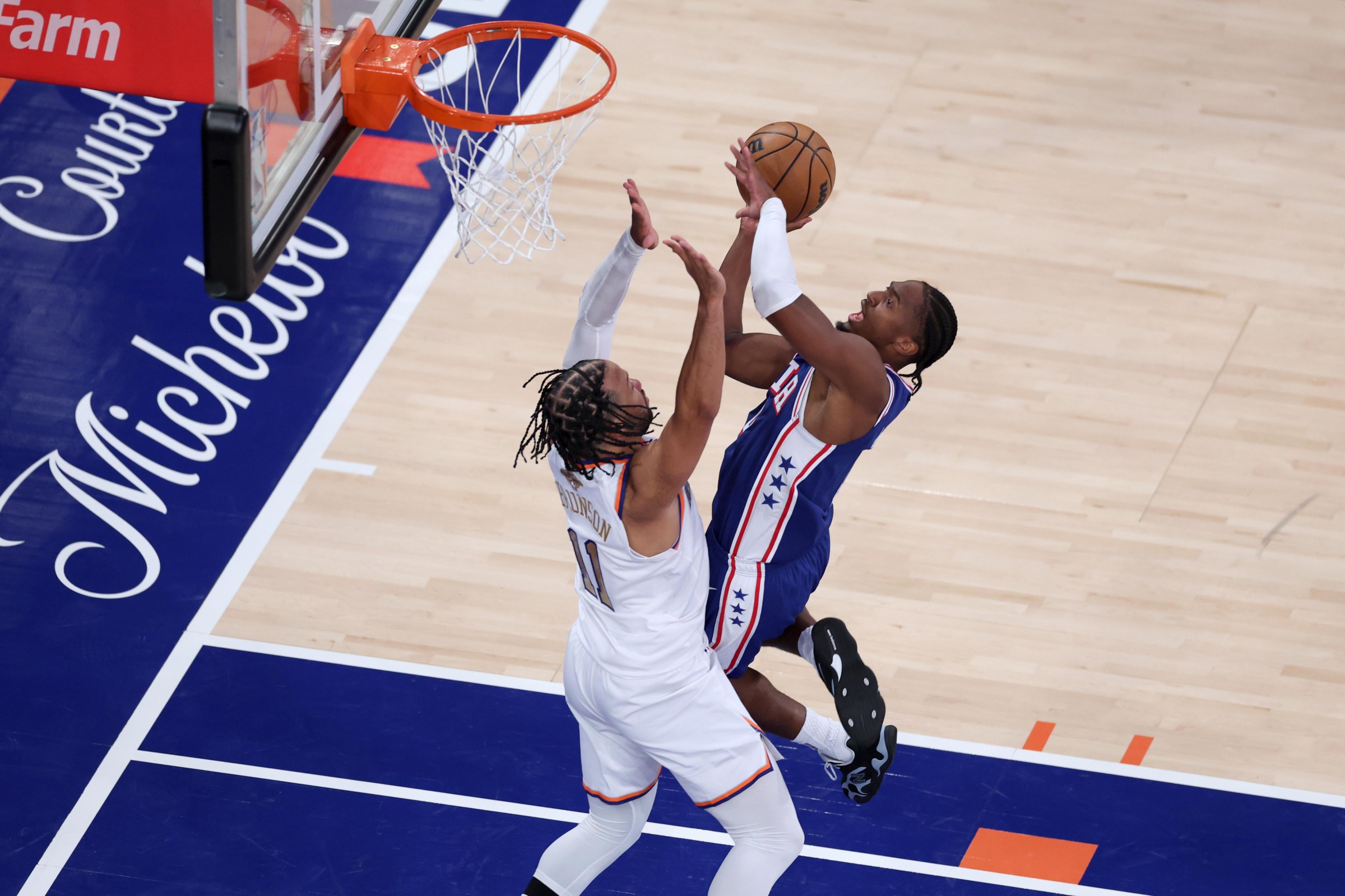 NEW YORK, NEW YORK - OCTOBER 20: Tyrese Maxey #0 of the Philadelphia 76ers shoots a layup during the third quarter of the game against Jalen Brunson #11 of the New York Knicks at Madison Square Garden on October 20, 2026 in New York City. NOTE TO USER: User expressly acknowledges and agrees that, by downloading and or using this photograph, User is consenting to the terms and conditions of the Getty Images License Agreement. (Photo by Caleb Bowlin/Getty Images)