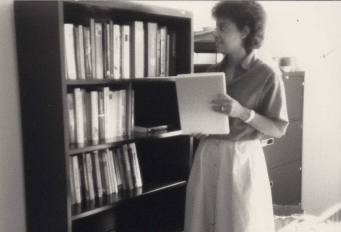 A black and white photo of Washington in a library.
