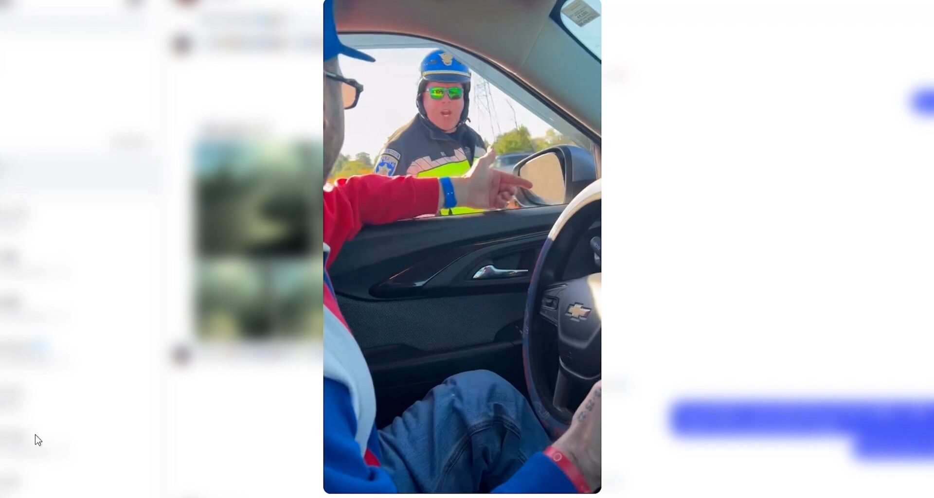 Video shows Erie County sheriff's deputy punch Victor driver's window during Bills game traffic on I-90