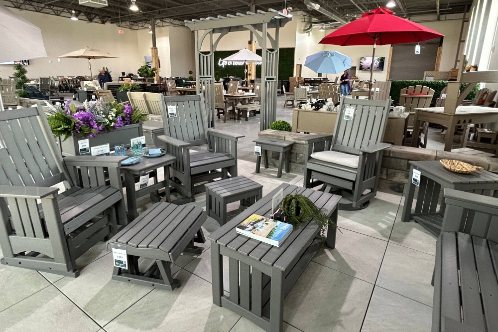 Outdoor furniture displayed in a showroom.