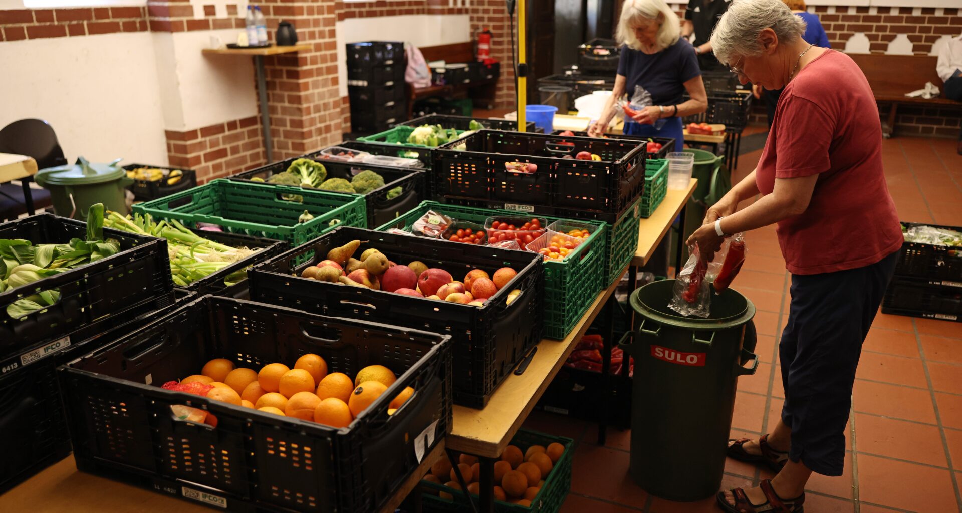 People receive assistance at a local food bank