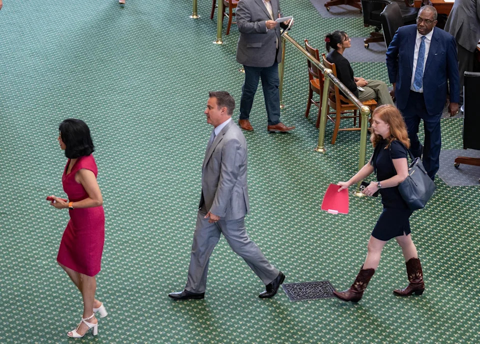 Mikala Compton/Austin American-Statesman via Getty Images, FILE - PHOTO: In this Aug. 12, 2025, file photo, a group of Senate Democrats walk off the Senate floor as the redistricting bill is brought up at the Texas Capitol in Austin, Texas.