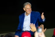 Gov. Greg Abbott waves to supports as he announces his re-election campaign for Texas...