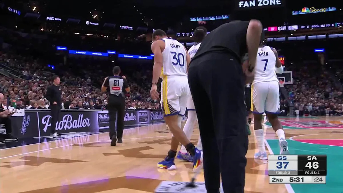 Stephen Curry gets the And-1