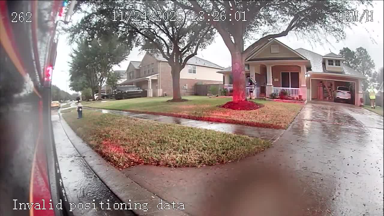 WATCH: Houston-area firefighters hunker in garage during tornado