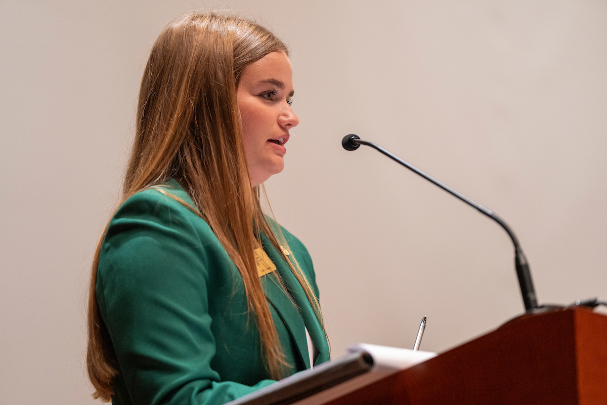 A young lady speaking at 4-H Congress