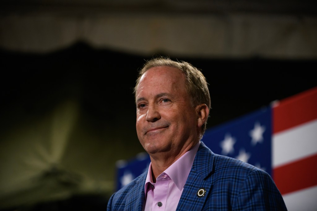 Texas Attorney General and U.S. Senate candidate Ken Paxton smiles after speaking at a campaign rally in Conroe on Oct. 29, 2025.