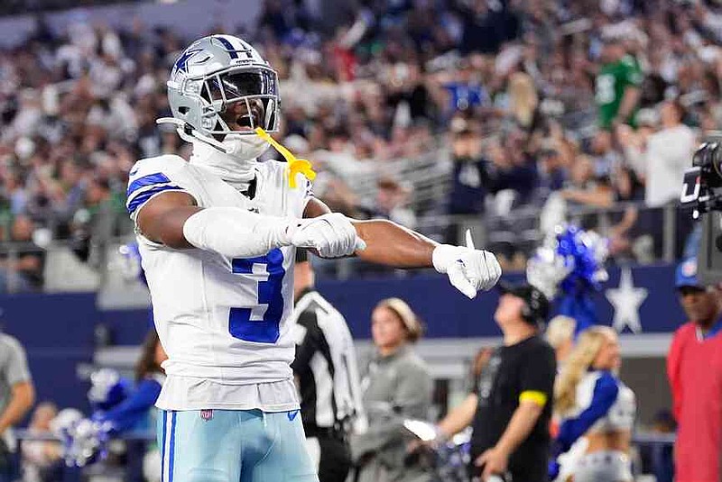 Dallas Cowboys wide receiver George Pickens (3) celebrates his touchdown catch during the first half of an NFL football game against the Philadelphia Eagles, Sunday, Nov. 23, 2025, in Arlington, Texas. (AP Photo/Tony Gutierrez)