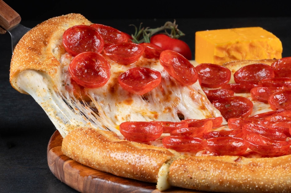 Cheese stuffed pizza crust topped with cheese and pepperoni.