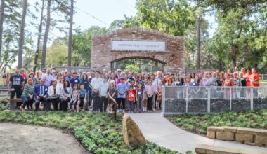 group of people in a garden