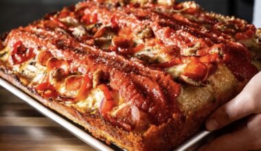 a close up of a deep dish pizza