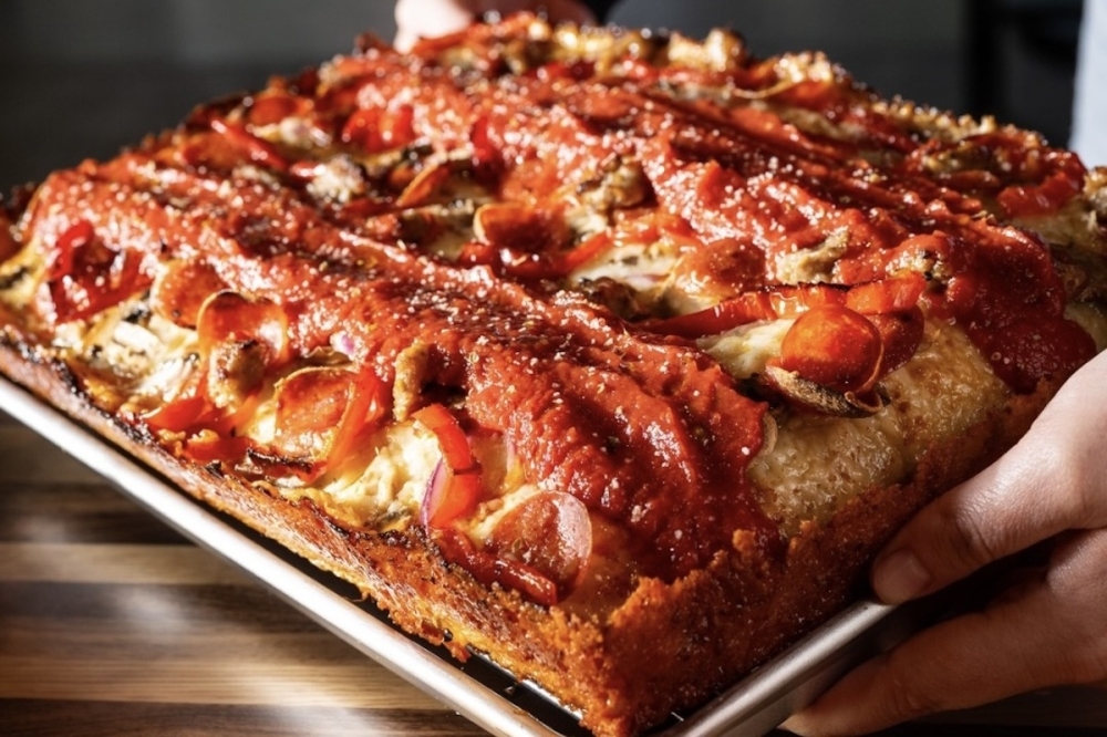 a close up of a deep dish pizza