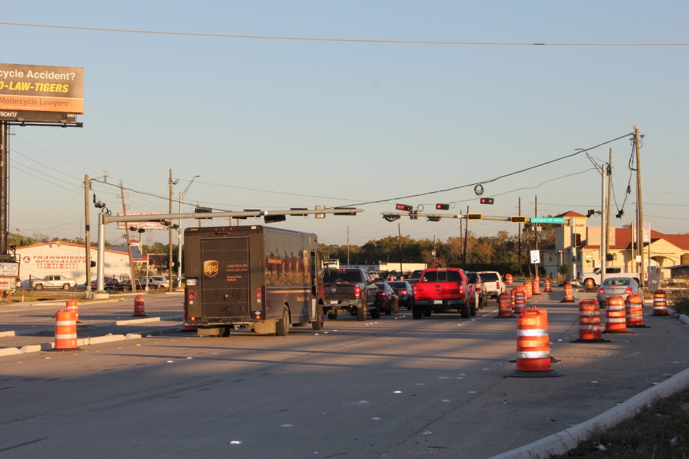 a road intersection with traffic lights