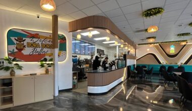 Interior of an eatery featuring Bora Bora Dallas signage.