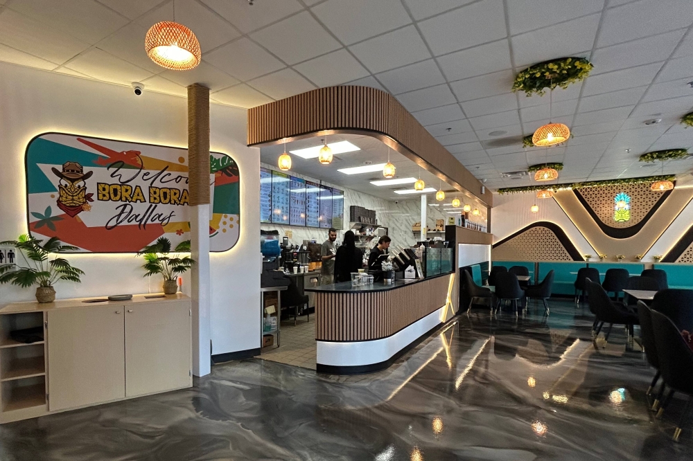 Interior of an eatery featuring Bora Bora Dallas signage.