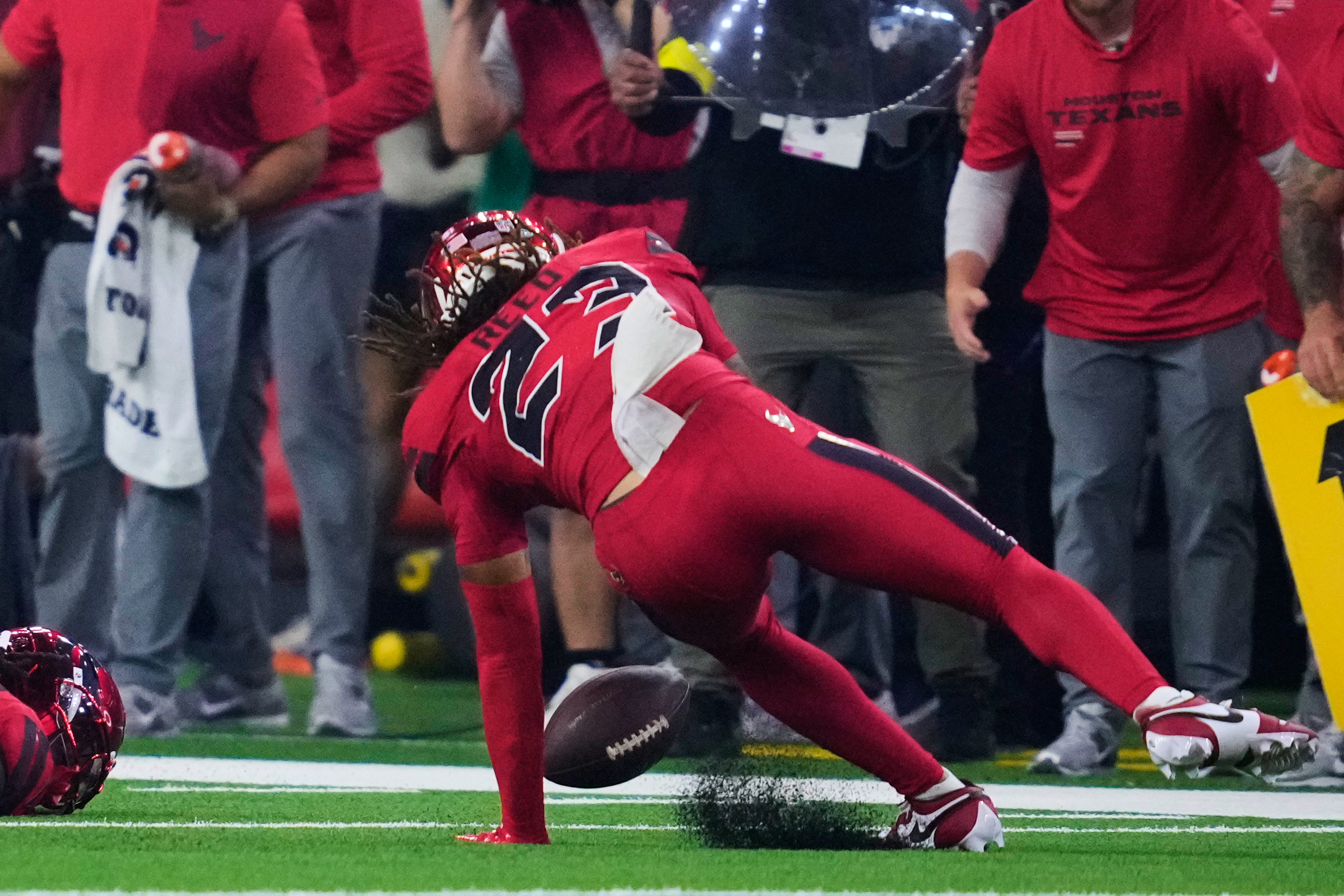 Houston Texans safety Jaylen Reed (23) recovers a Buffalo Bills' Khalil Shakir (10) fumble in the second half of an NFL football game Thursday, Nov. 20, 2025, in Houston. (AP Photo/Ashley Landis)