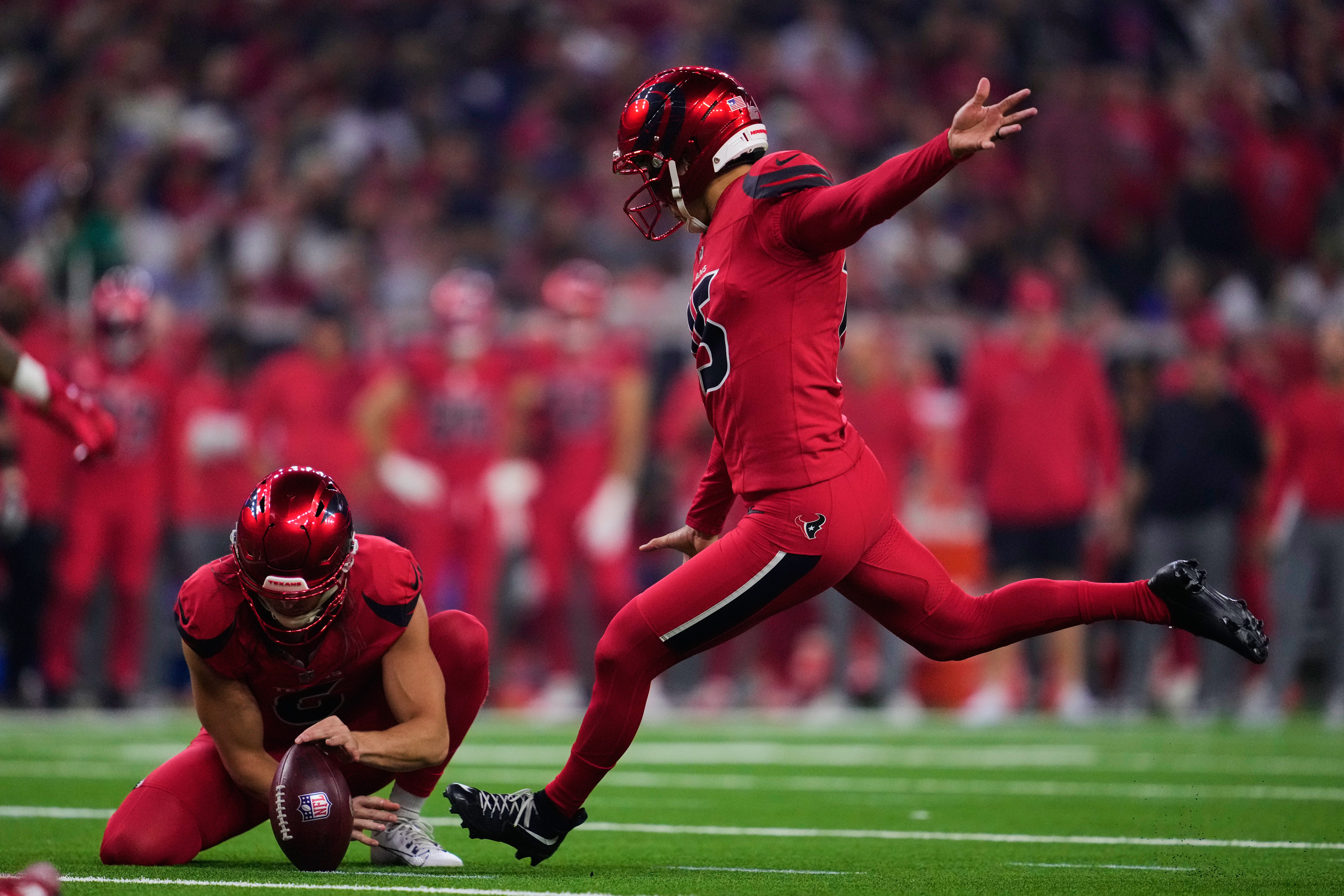 Houston Texans place kicker Ka'imi Fairbairn (15) kicks a field goal in the second half of an NFL football game against the Buffalo Bills Thursday, Nov. 20, 2025, in Houston. (AP Photo/Ashley Landis)