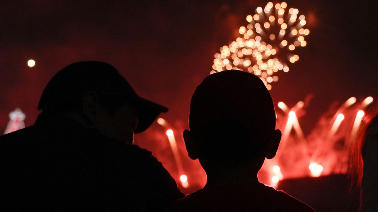 Spectators watch fireworks Saturday, June 8, 2024. (AP Photo/Ryan Sun)