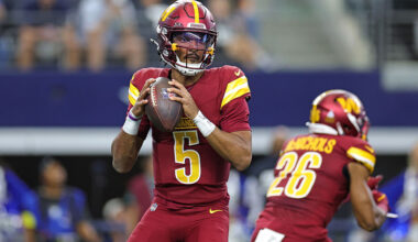 ARLINGTON, TEXAS - OCTOBER 19: Jayden Daniels #5 of the Washington Commanders looks to pass during the first half against the Dallas Cowboys at AT&T Stadium on October 19, 2025 in Arlington, Texas. (Photo by Stacy Revere/Getty Images)