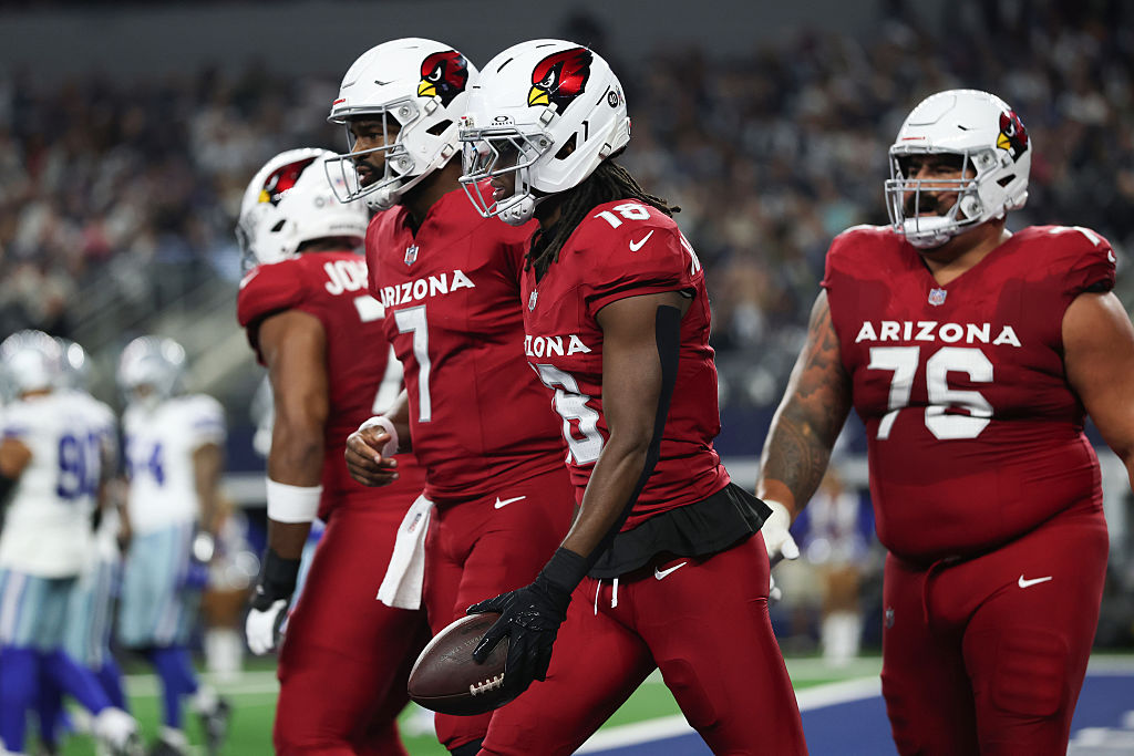 ARLINGTON, TEXAS - NOVEMBER 03: Marvin Harrison Jr. #18 of the Arizona Cardinals celebrates his touchdown with Jacoby Brissett #7 against the Dallas Cowboys during the second quarter in the game at AT&T Stadium on November 03, 2025 in Arlington, Texas. (Photo by Stacy Revere/Getty Images)