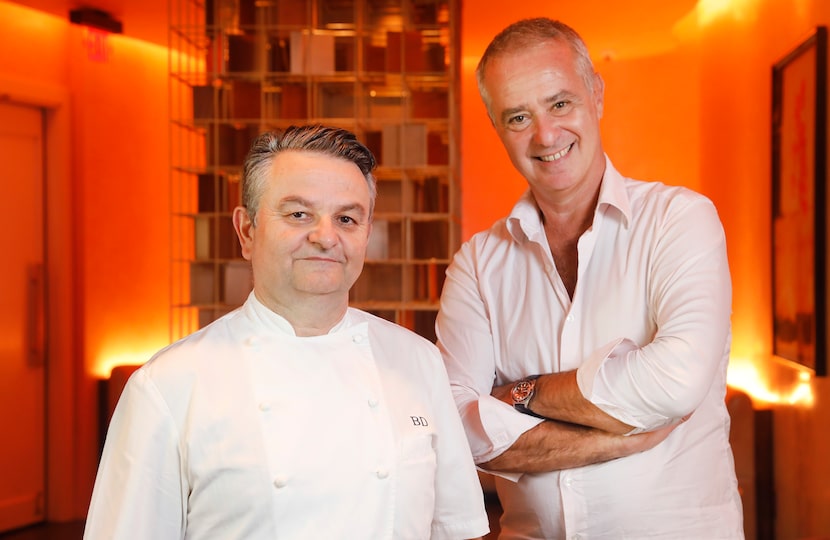 Stephan Courseau (right) and chef Bruno Davaillon, who is the culinary director for Travis...