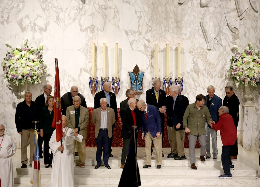 A group of veterans takes the stage as Saint Michael and All Angels Episcopal Church holds...