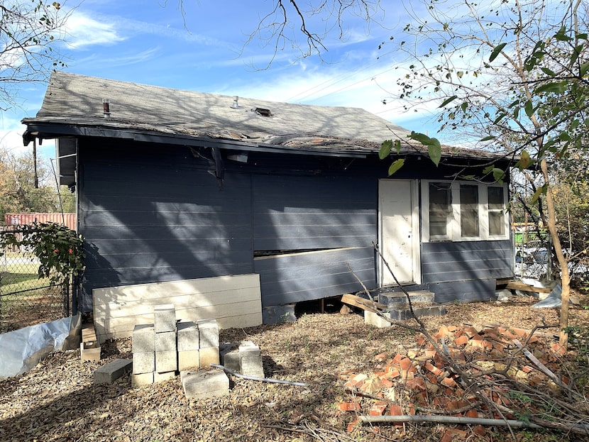 The rear of 2642 Eugene St., with its collapsing roof and detached back wall