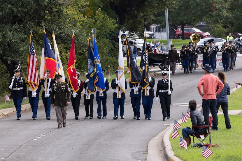 In this 2023 photo, participants in the Tarrant County Veterans Day Parade march down North...