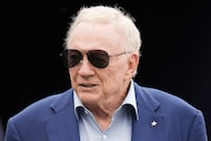 Dallas Cowboys owner and general manager Jerry Jones walks onto the field before an NFL...