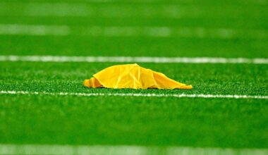 Sep 28, 2025; Arlington, Texas, USA; A view of a yellow penalty flag during the game between the Dallas Cowboys and the Green Bay Packers at AT&T Stadium.