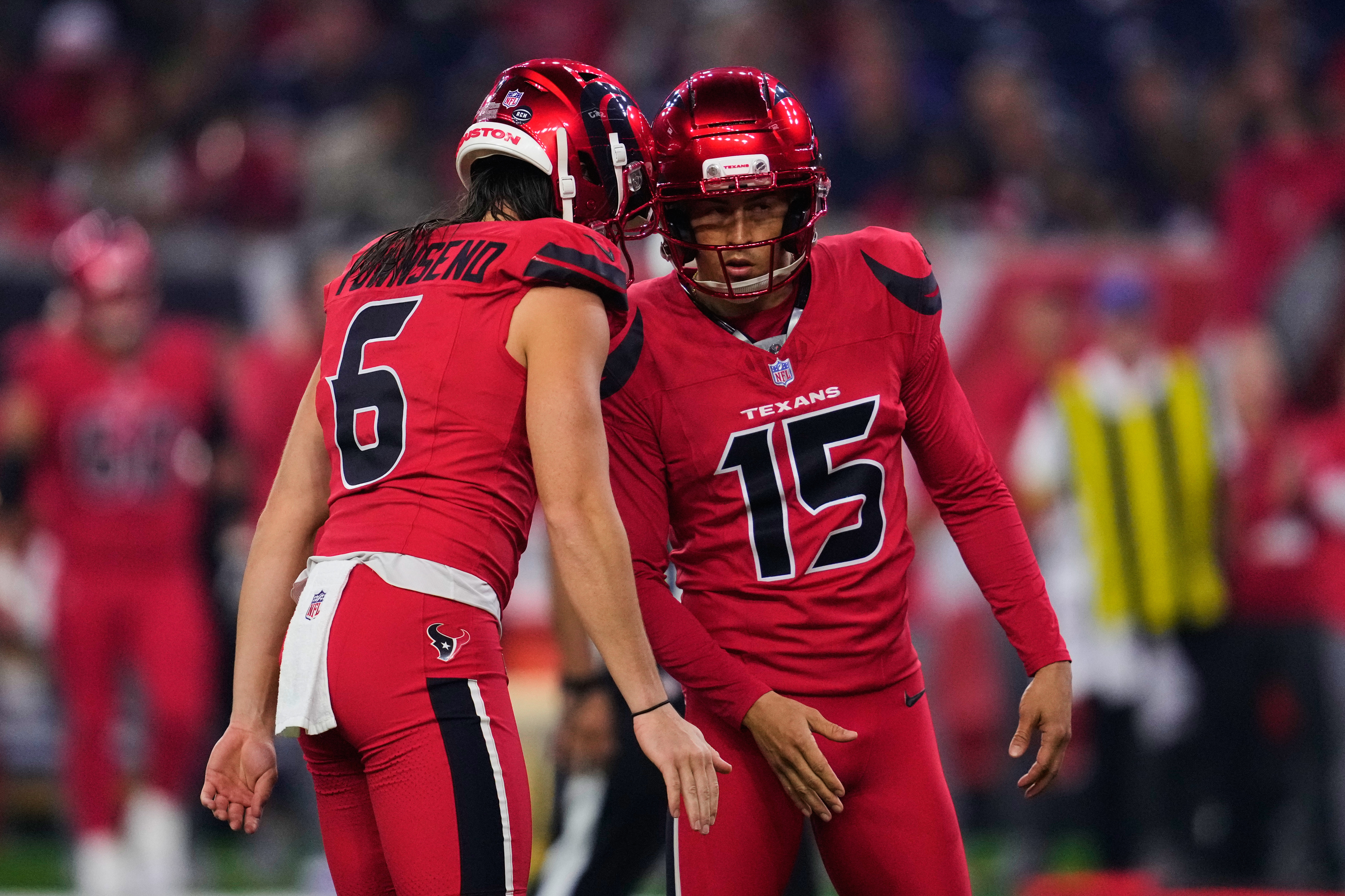 Houston Texans' Tommy Townsend (6) and Ka'imi Fairbairn (15) celebrate after Fairbairn kicked a field goal in the first half of an NFL football game against the Buffalo Bills Thursday, Nov. 20, 2025, in Houston. (AP Photo/Ashley Landis)