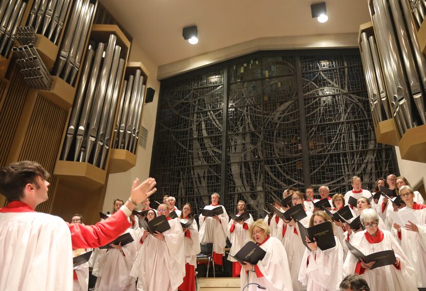 The choir sings as Saint Michael and All Angels Episcopal Church holds its annual Veterans...