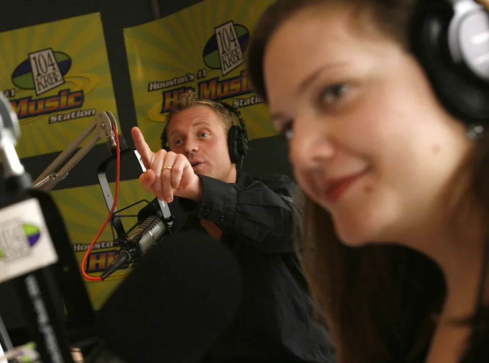 Roula Christie, right, and Ryan Chase conduct their first show Monday morning July 24, 2006 at KRBE in Houston. (Sharon Steinmann/Houston Chronicle)