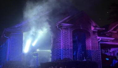 Grand Prairie firefighters rescue 3 people from burning home, officials say