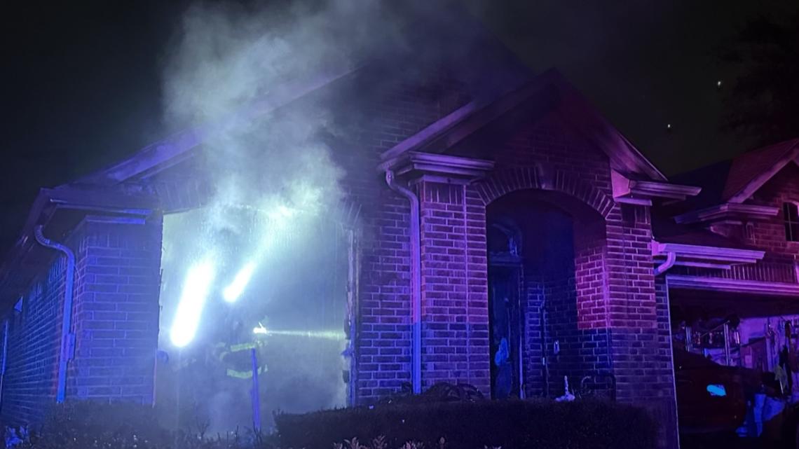 Grand Prairie firefighters rescue 3 people from burning home, officials say