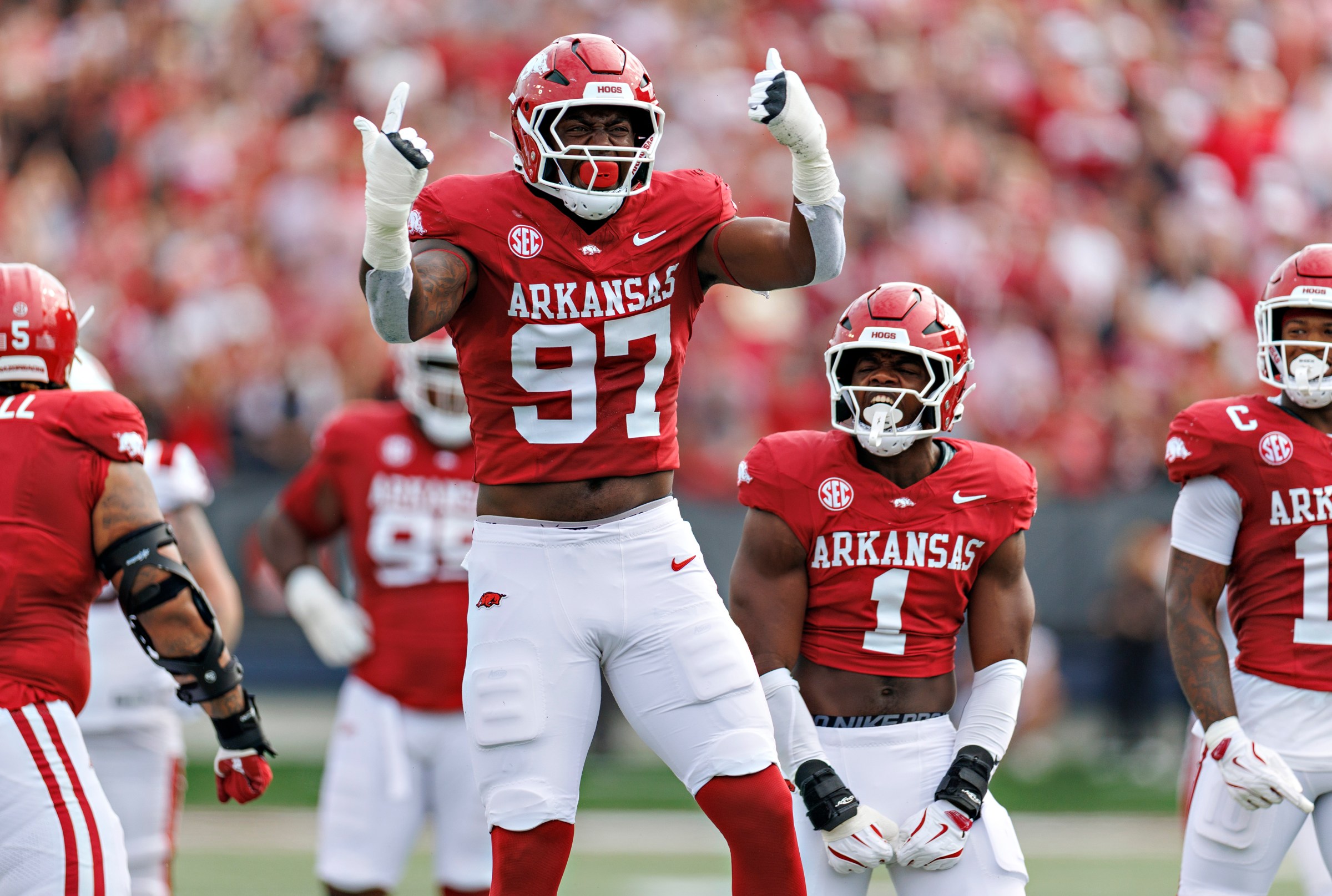 LITTLE ROCK, ARKANSAS - SEPTEMBER 06: Quincy Rhodes Jr. #97 of the Arkansas Razorbacks celebrates after a quarterback sack in the first during the game against the Arkansas State Red Wolves at War Memorial Stadium on September 06, 2025 in Little Rock, Arkansas. The Razorbacks defeated the Red Wolves 56-14. (Photo by Wesley Hitt/Getty Images)