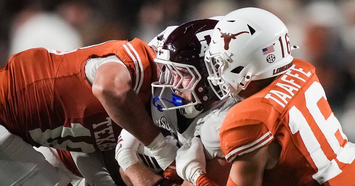 Texas deals rival Texas A&M more pain in spoiling Aggies' perfect season