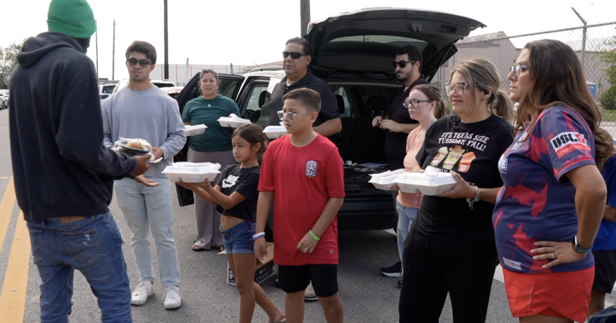 Local cafe and football club team up to serve holiday meals to neighbors in need