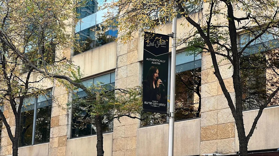 A banner of Kacey Musgraves was installed in downtown Austin’s 2nd Street District. Several banners in the area showcase iconic Austin and Texas performers who have performed on Austin PBS’s Austin City Limits. (KXAN Photo/Abigail Jones)
