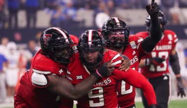 Texas Tech players Lee Hunter (left) and Jacob Rodriguez (back) celebrate Romello Height's fumble recover against BYU during the Big 12 Conference championship football game, Saturday, Nov. 6, 2025, at AT&T Stadium in Arlington.