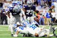 Detroit Lions cornerback Rock Ya-Sin (23) forces Dallas Cowboys wide receiver George Pickens...