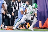 North Texas tight end Tre Williams III (6) makes a touchdown against Tulane linebacker...