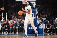 Dallas Mavericks forward/center Anthony Davis drives the ball against the Oklahoma City...