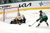 Dallas Stars right wing Mikko Rantanen (96) scores past Pittsburgh Penguins goaltender...