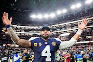 Dallas Cowboys quarterback Dak Prescott celebrates after a victory over the Kansas City...