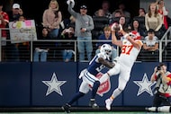 Kansas City Chiefs tight end Travis Kelce (87) catches a touchdown pass over Dallas Cowboys...