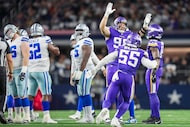 Minnesota Vikings linebacker Bo Richter (98) and linebacker Eric Wilson (55) celebrate after...