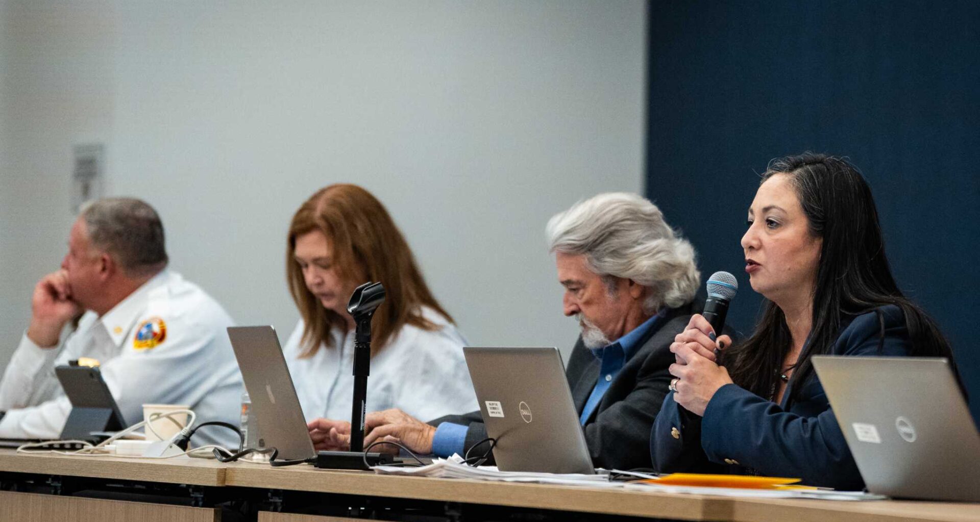 Acting Chief Labor Relations Officer Roxy Stevens, right, lays out ground rules for bargaining between the Austin Firefighters Association and the City of Austin as contract negotiations begin at the City of Austin Permitting and and Development Center, July 30, 2025.